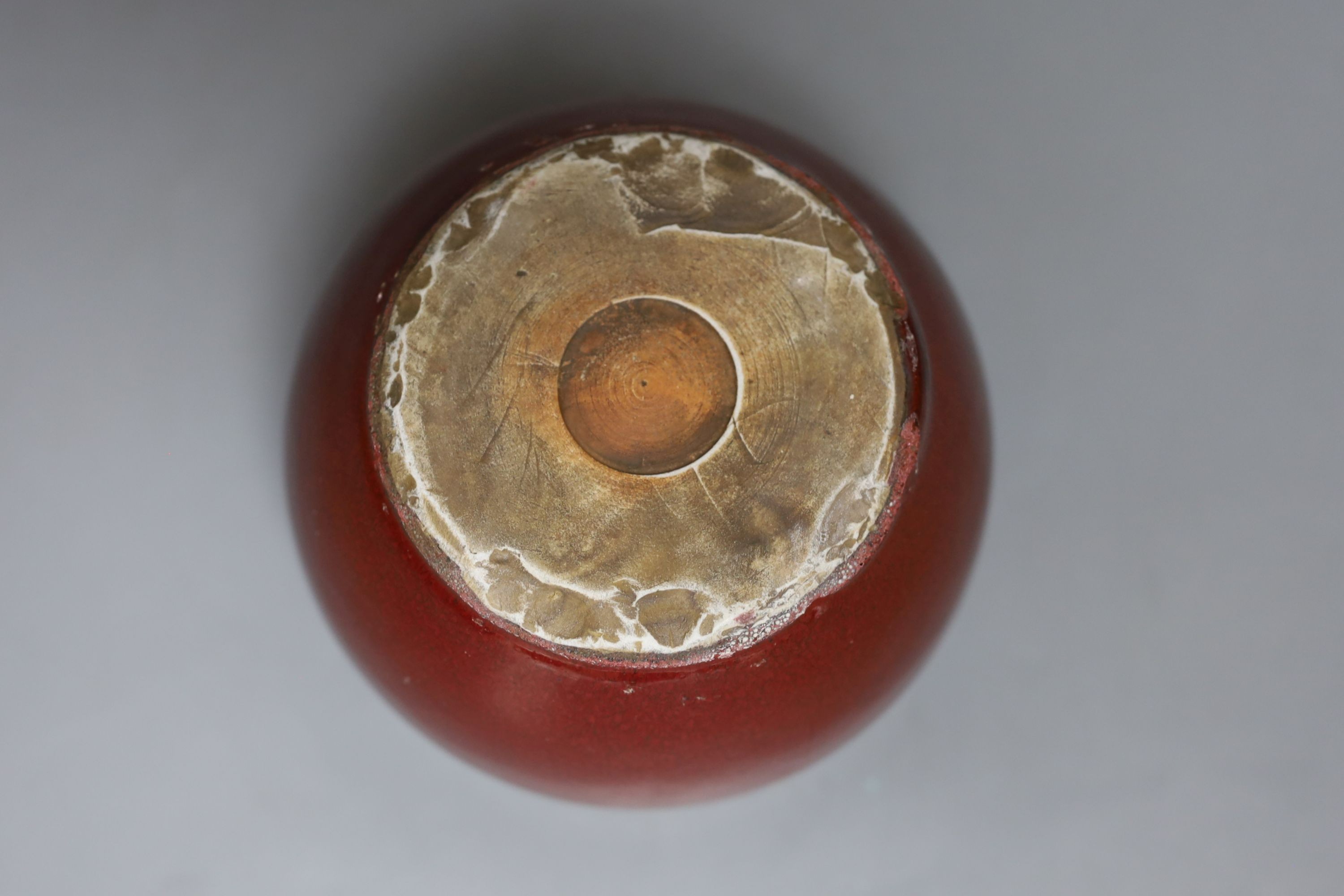 A Chinese sang de boeuf glazed jardiniere - 11cm tall